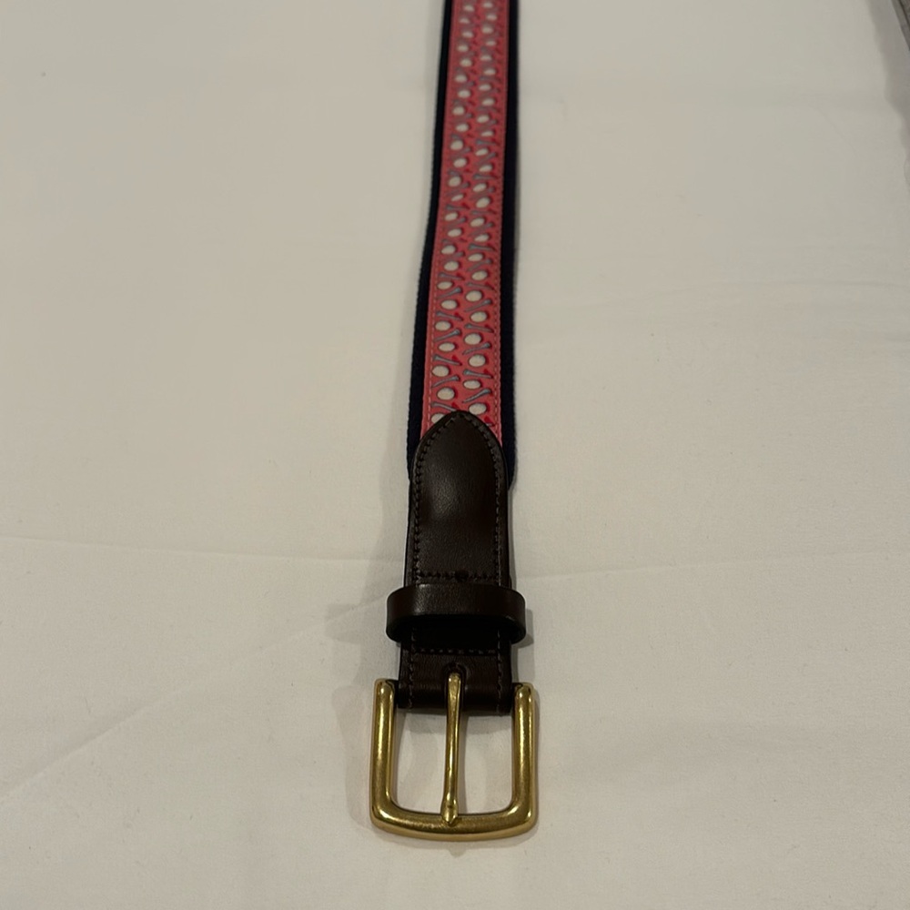 Vineyard Vines pink golf ball and tee belt.